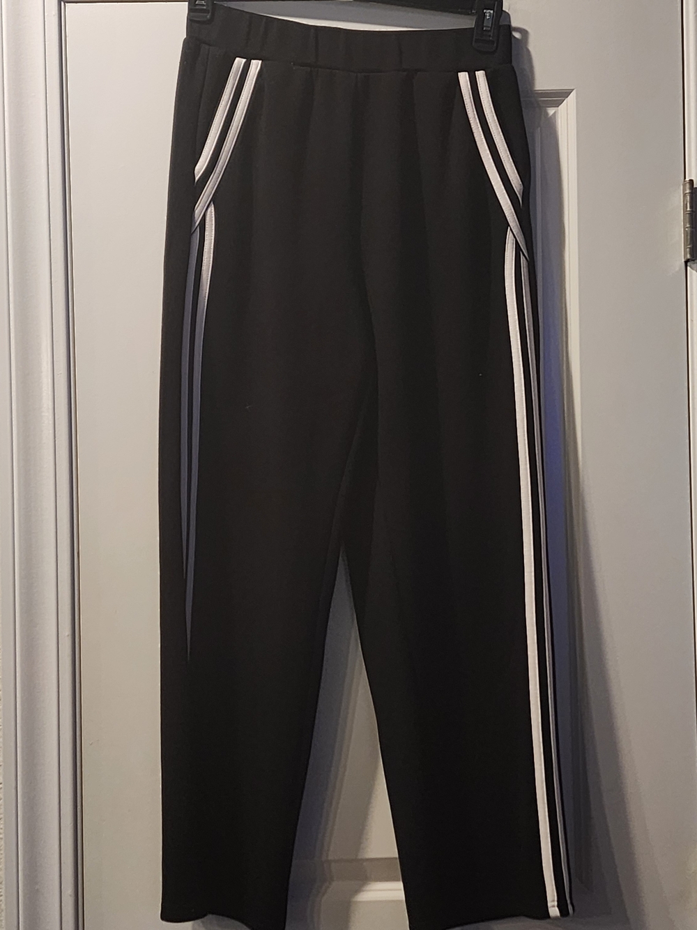 Xieerduo Black Track Pants with White Side Stripes Size Large. Item 0421261P